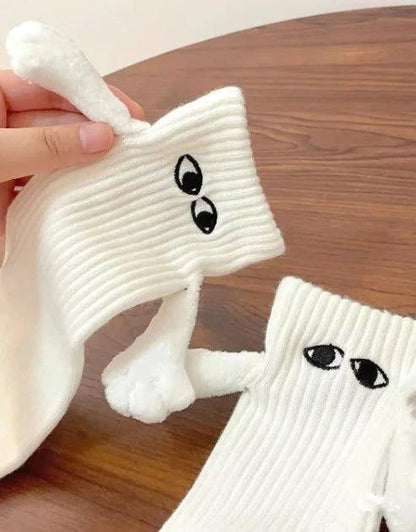 Magnetic Hand - Holding Socks