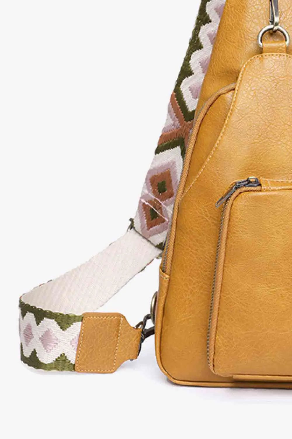 Travel Light and Stylish with the Take A Trip Small Sling Bag | Solid Pattern and PU Leather Material
